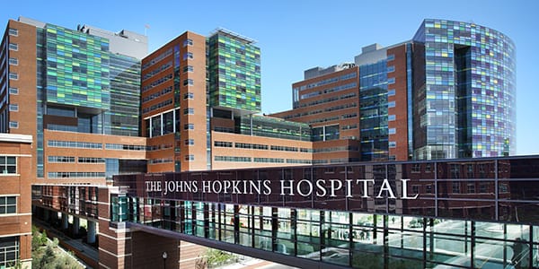 Diverse group of people joining their hands in the shape of a heartJohns Hopkins Hospital